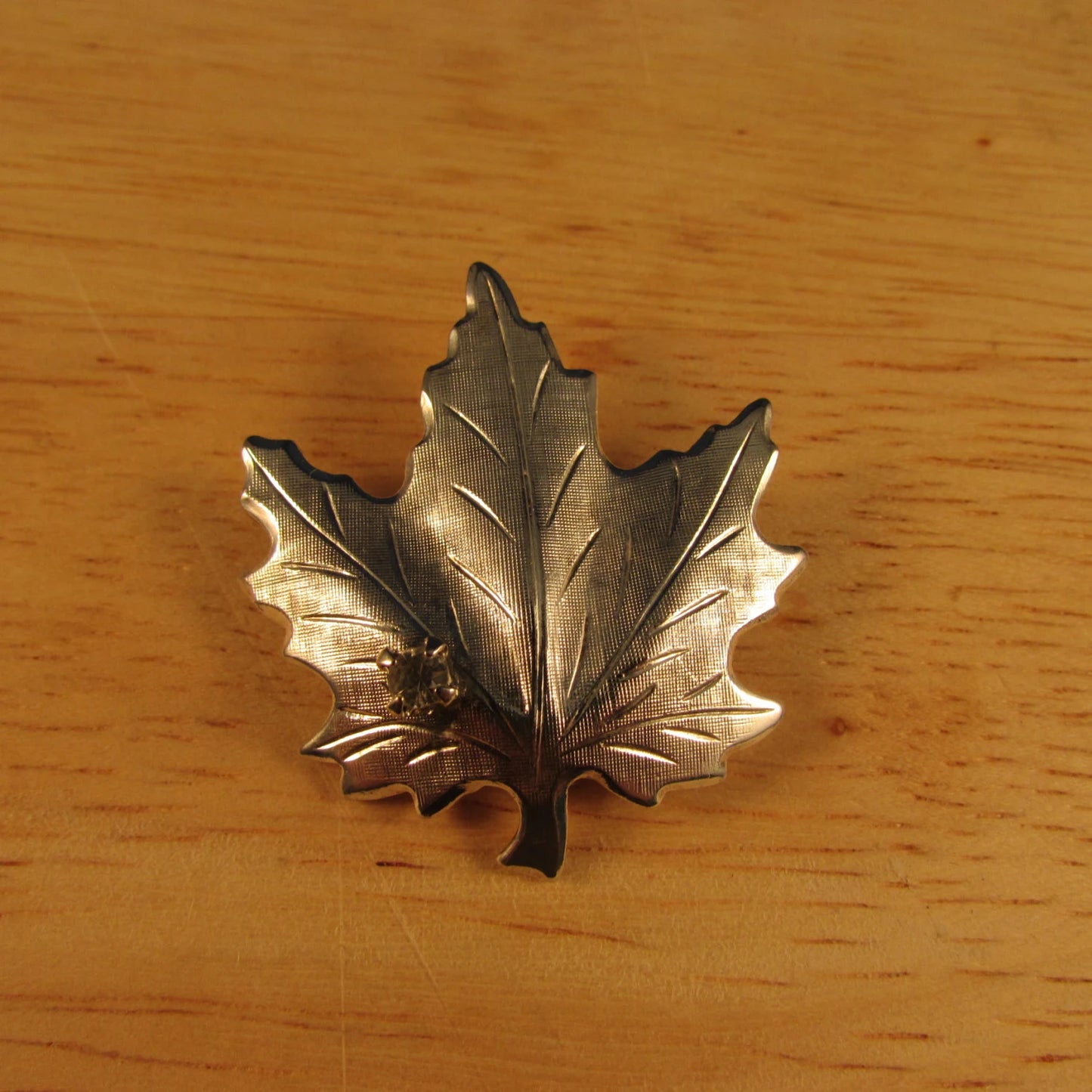 Vintage brushed silver-tone maple leaf brooch with diamanté detail