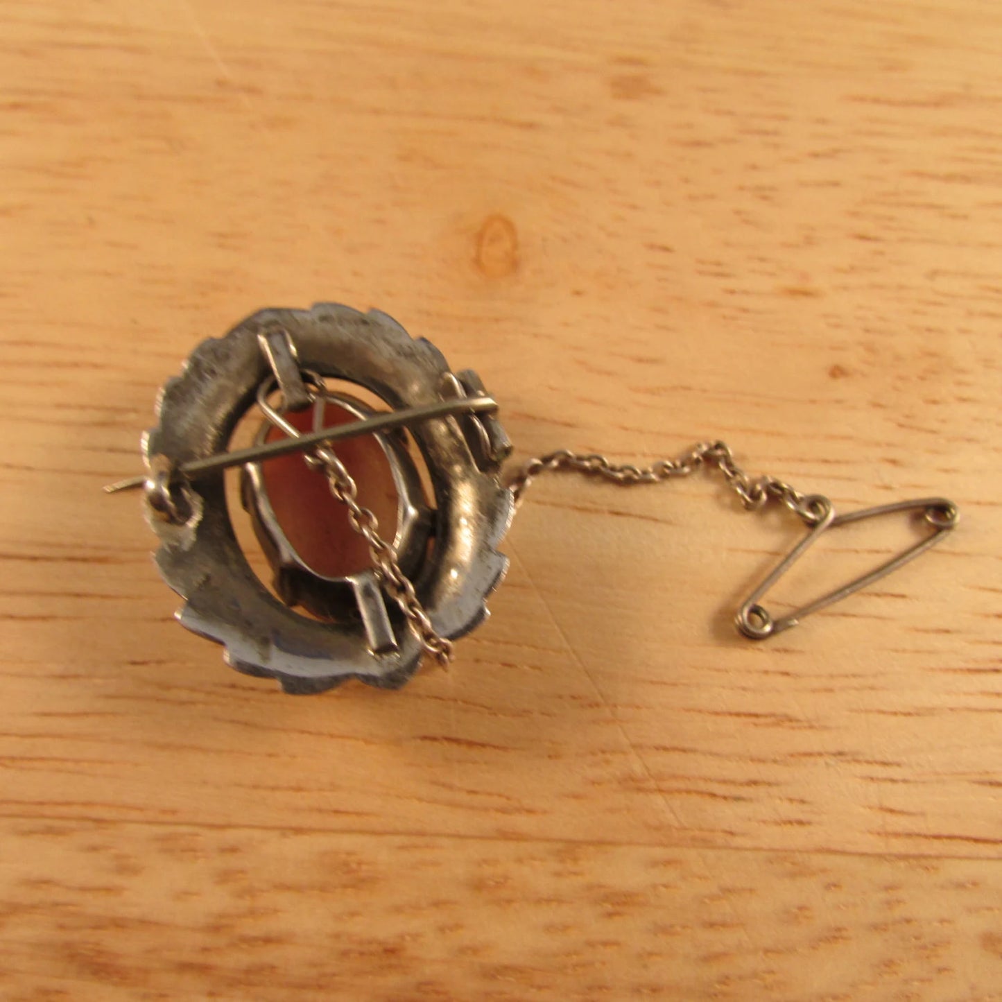 Victorian silver marcasite cameo wreath brooch with safety chain