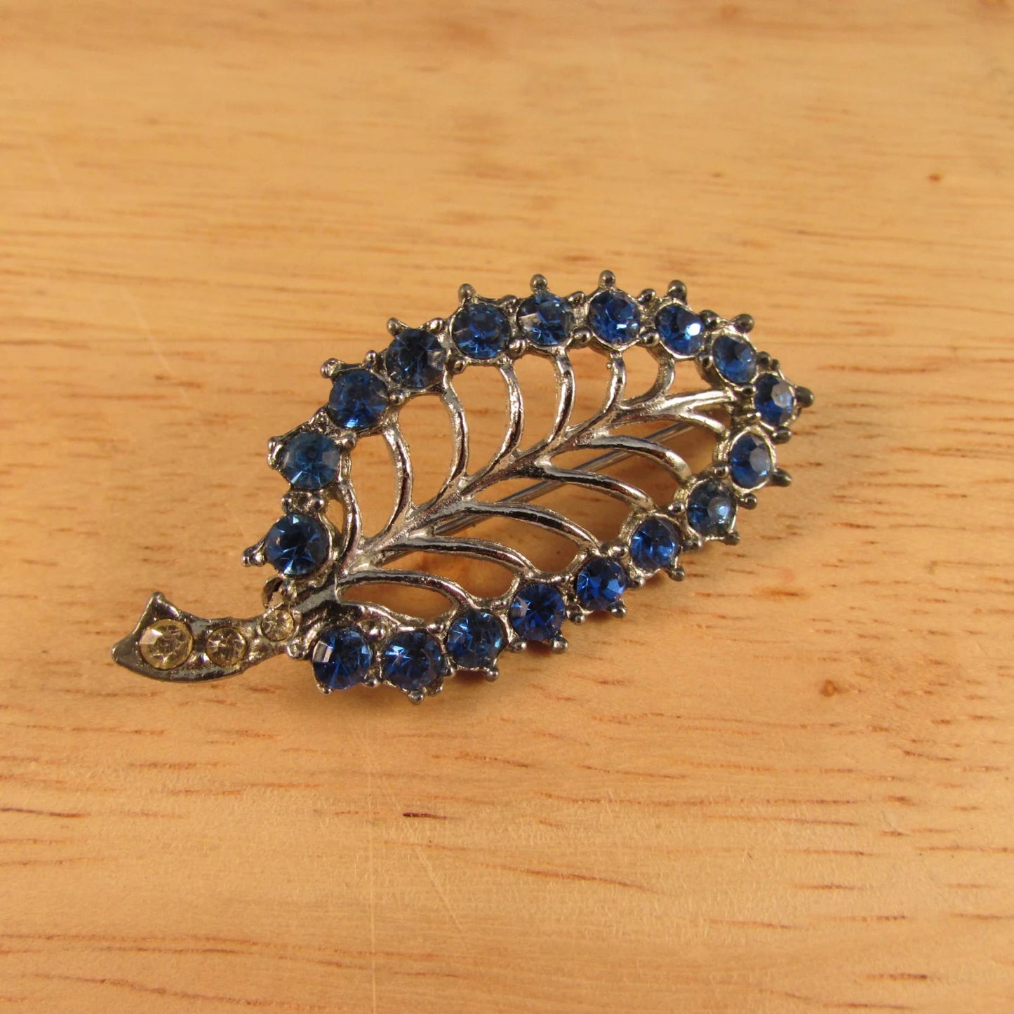 1960s silver-tone skeletal leaf brooch, sapphire blue & clear diamanté