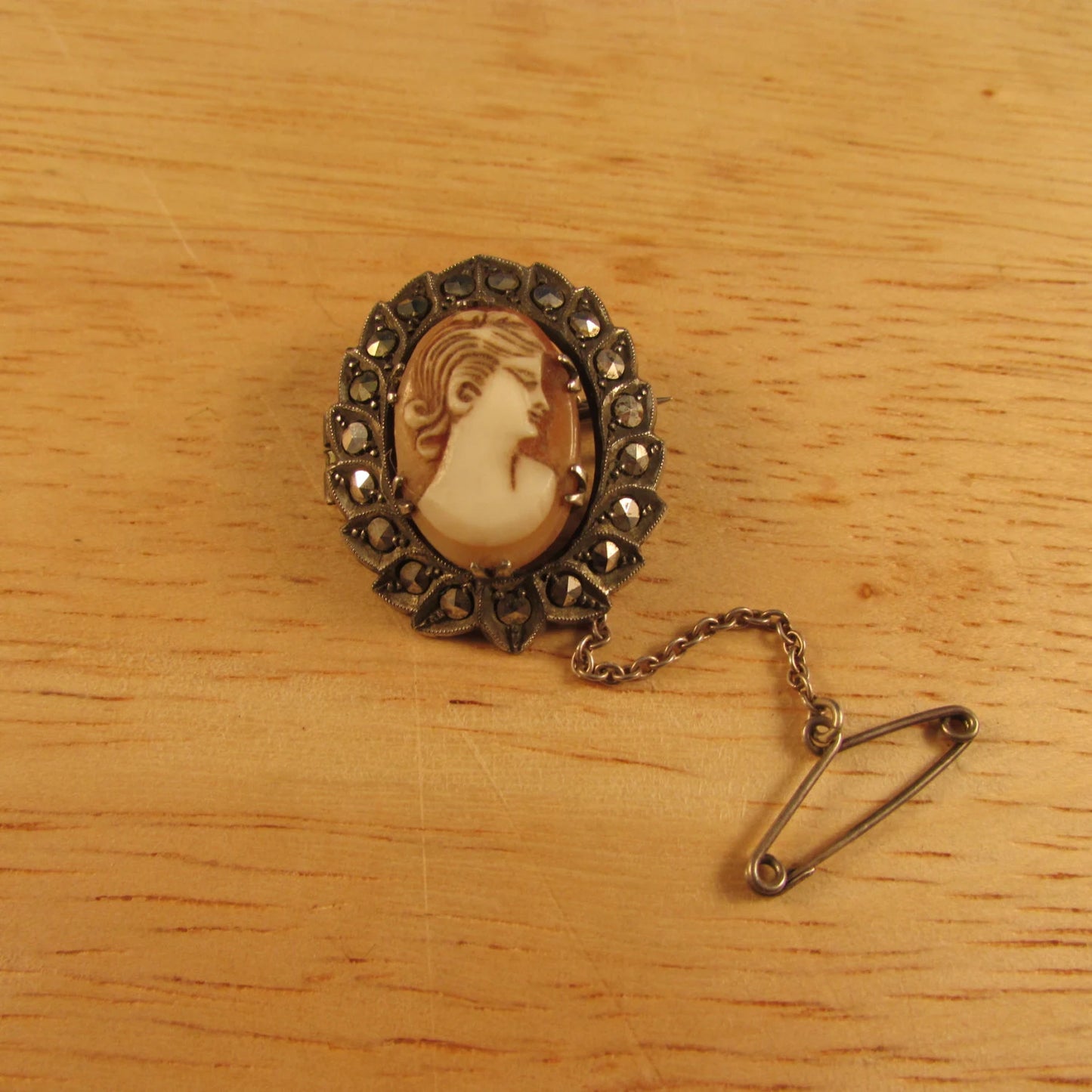 Victorian silver marcasite cameo wreath brooch with safety chain