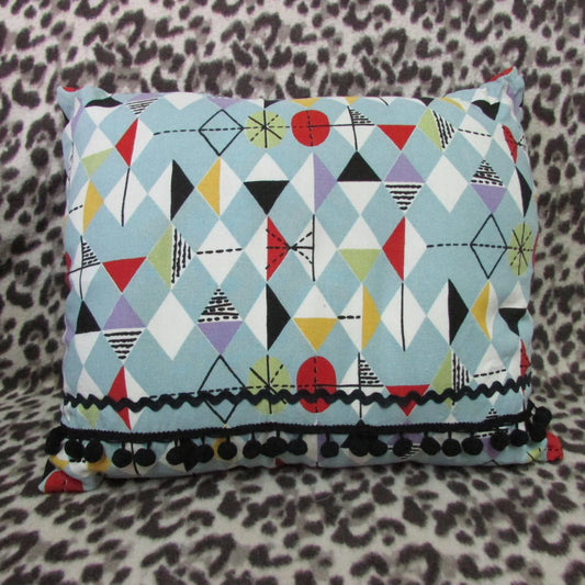 Home-made mid-century Marian Mahler atomic fabric cushion, black ric-rac, & pompom trim, and contrast black reverse