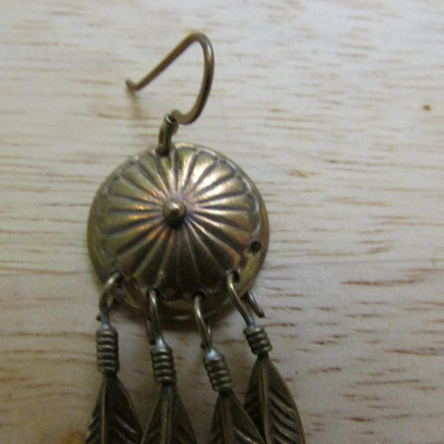 1980s/early 1990s gold-coppery-tone "dreamcatcher" shield earrings with drop feather detail