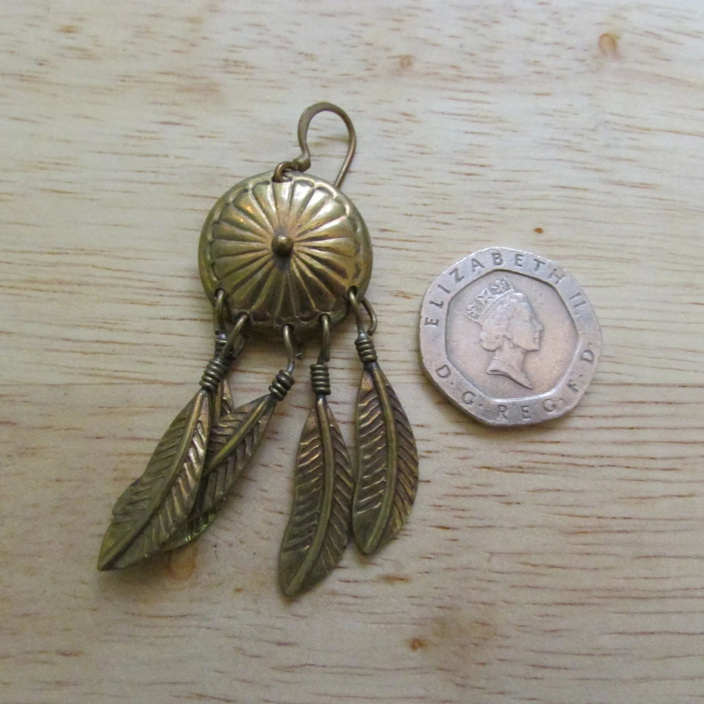 1980s/early 1990s gold-coppery-tone "dreamcatcher" shield earrings with drop feather detail
