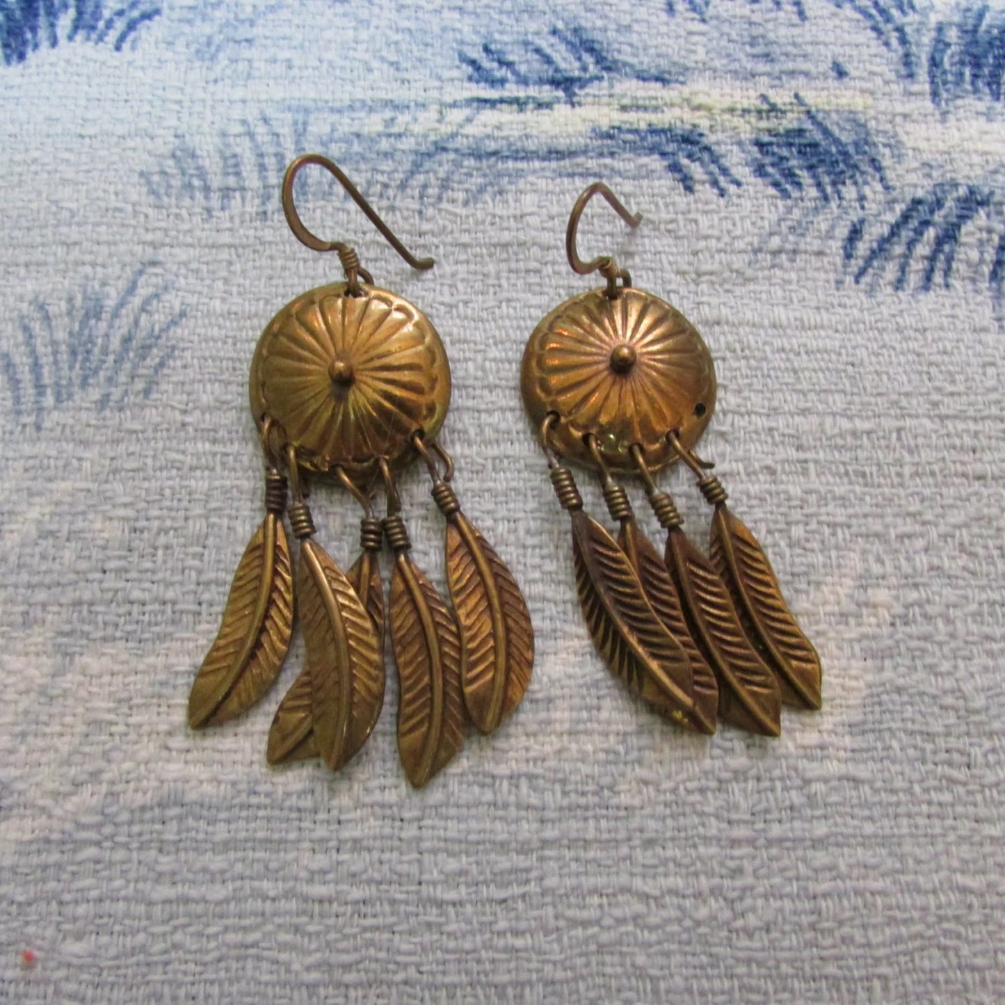 1980s/early 1990s gold-coppery-tone "dreamcatcher" shield earrings with drop feather detail