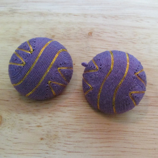 circa. 1980s large purple & gold thread covered button clip-on earrings