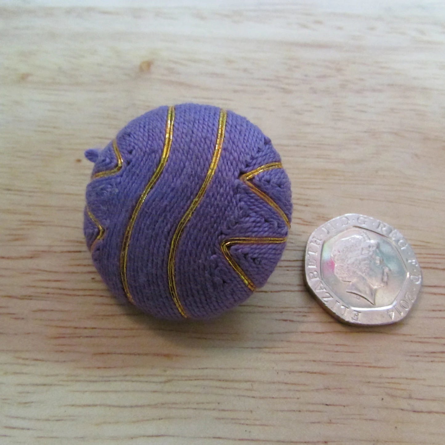 circa. 1980s large purple & gold thread covered button clip-on earrings