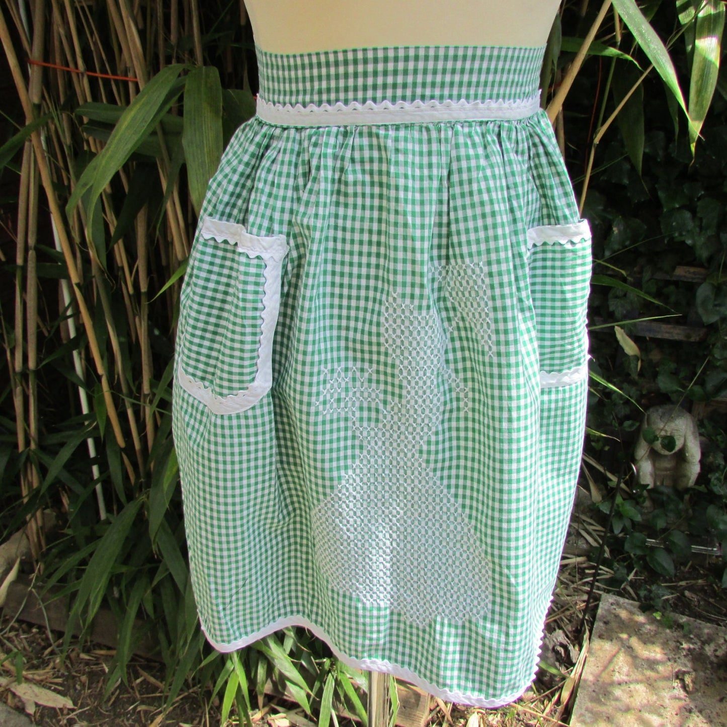 1950s/60s green gingham half apron with contrast white trim & cross stitch crinoline lady detail