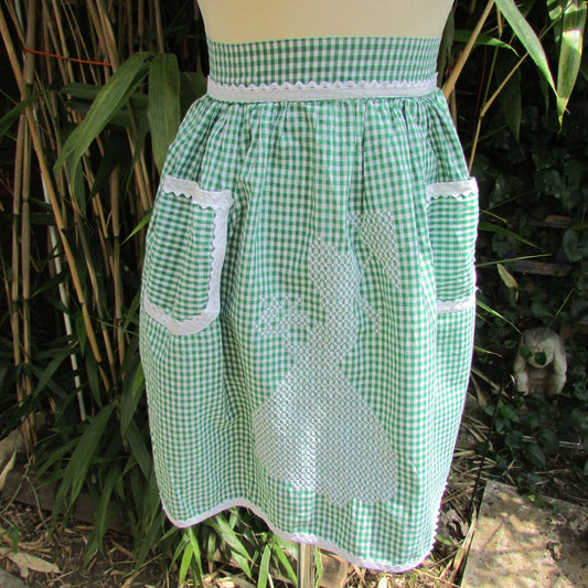 1950s/60s green gingham half apron with contrast white trim & cross stitch crinoline lady detail