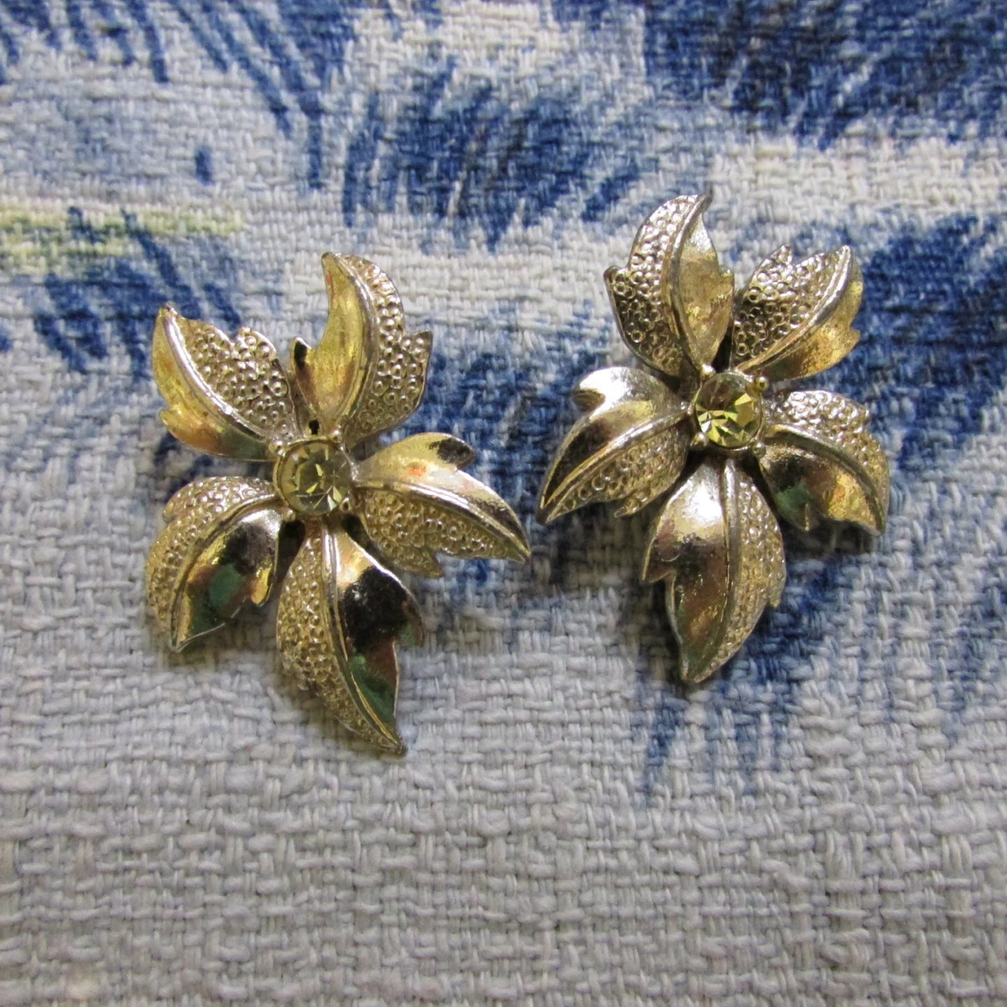 Late 1950s silver-tone & citrine rhinestone textured flower clip-on earrings