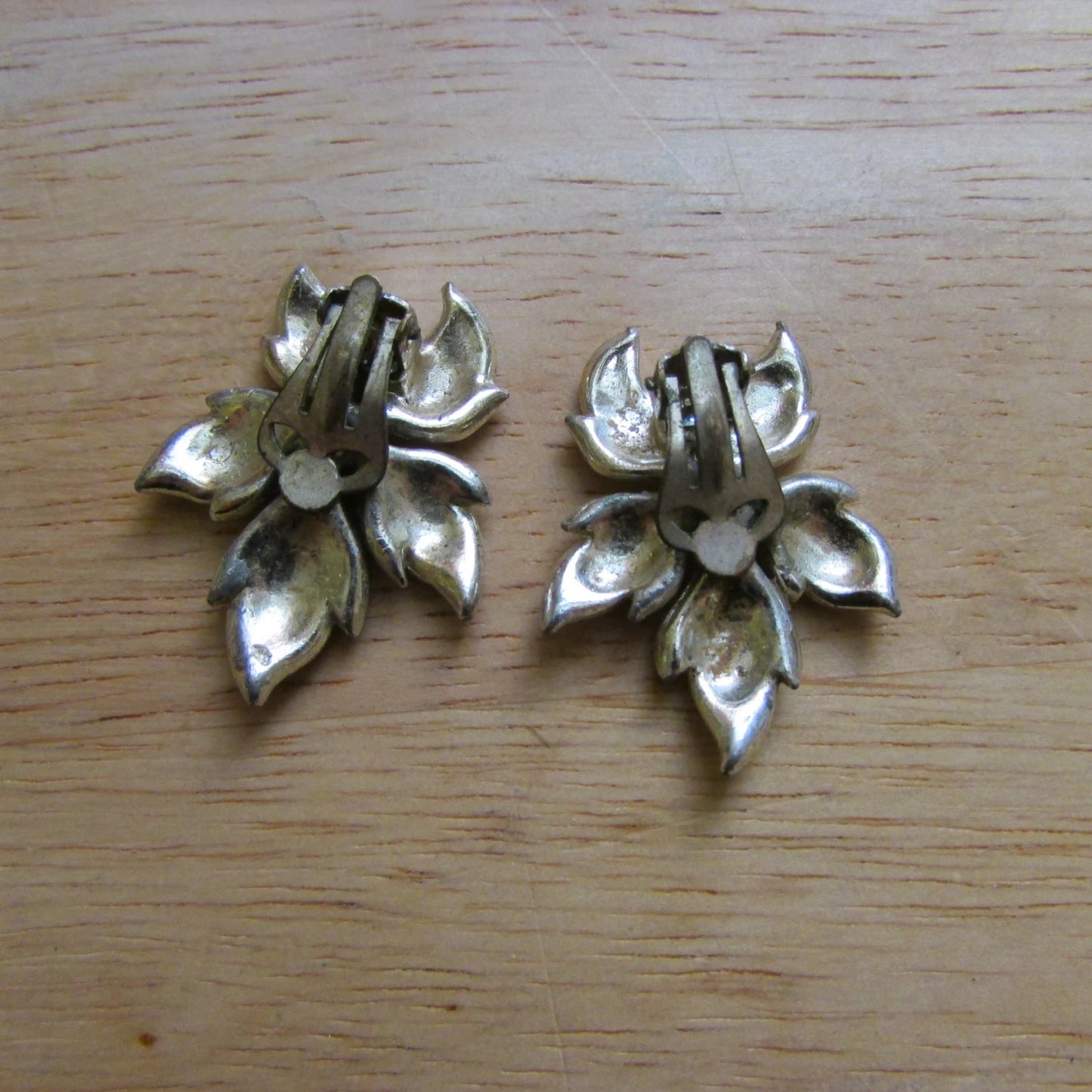 Late 1950s silver-tone & citrine rhinestone textured flower clip-on earrings