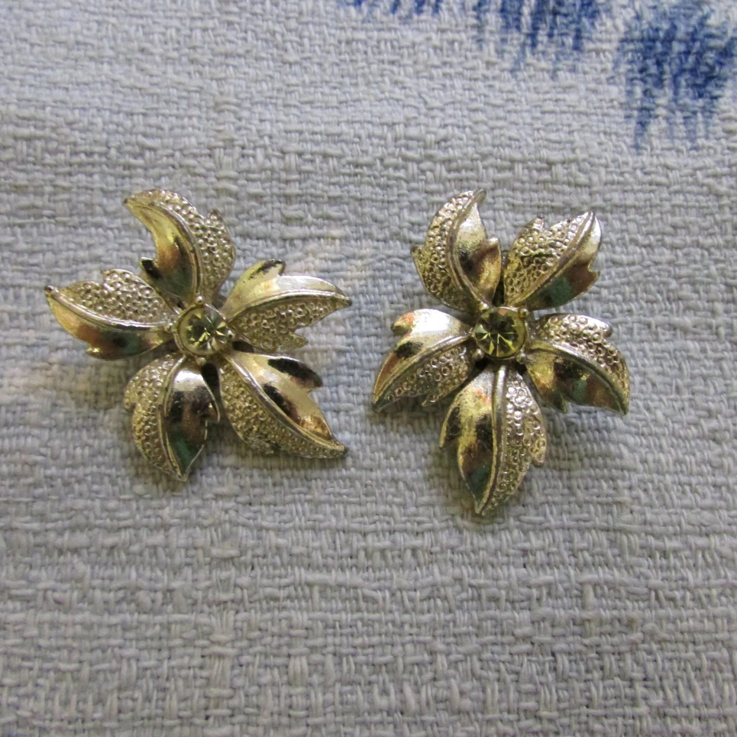 Late 1950s silver-tone & citrine rhinestone textured flower clip-on earrings