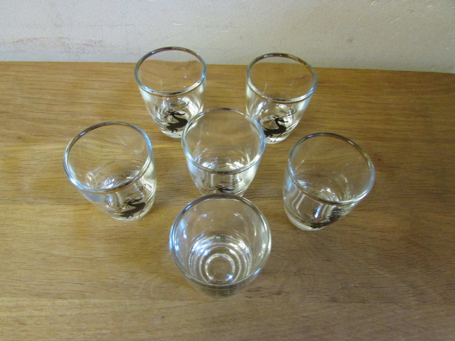 Set of 6 mid-century black & gilt reindeer shot glasses