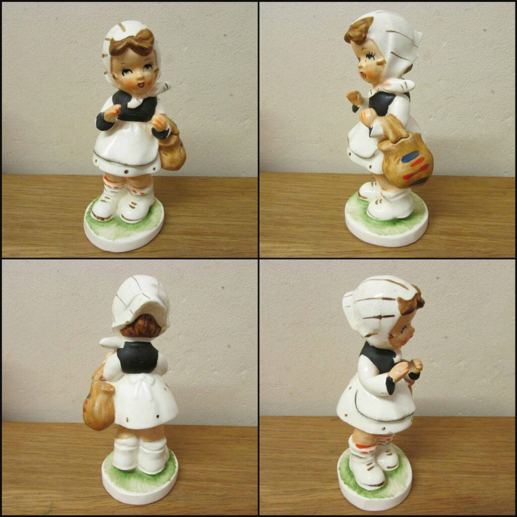 Set of four vintage Hummel-style ceramic figurines