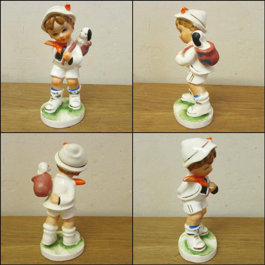Set of four vintage Hummel-style ceramic figurines