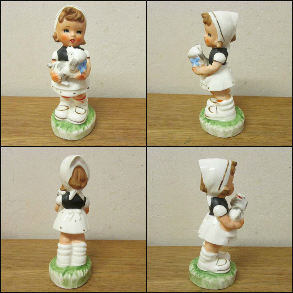 Set of four vintage Hummel-style ceramic figurines