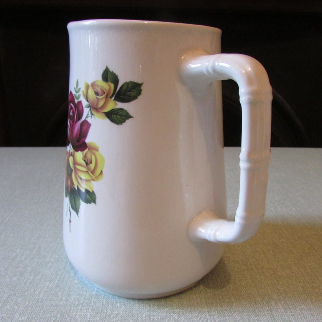 Vintage Sampson Bridgwood floral patterned milk jug, bamboo design detail on handle