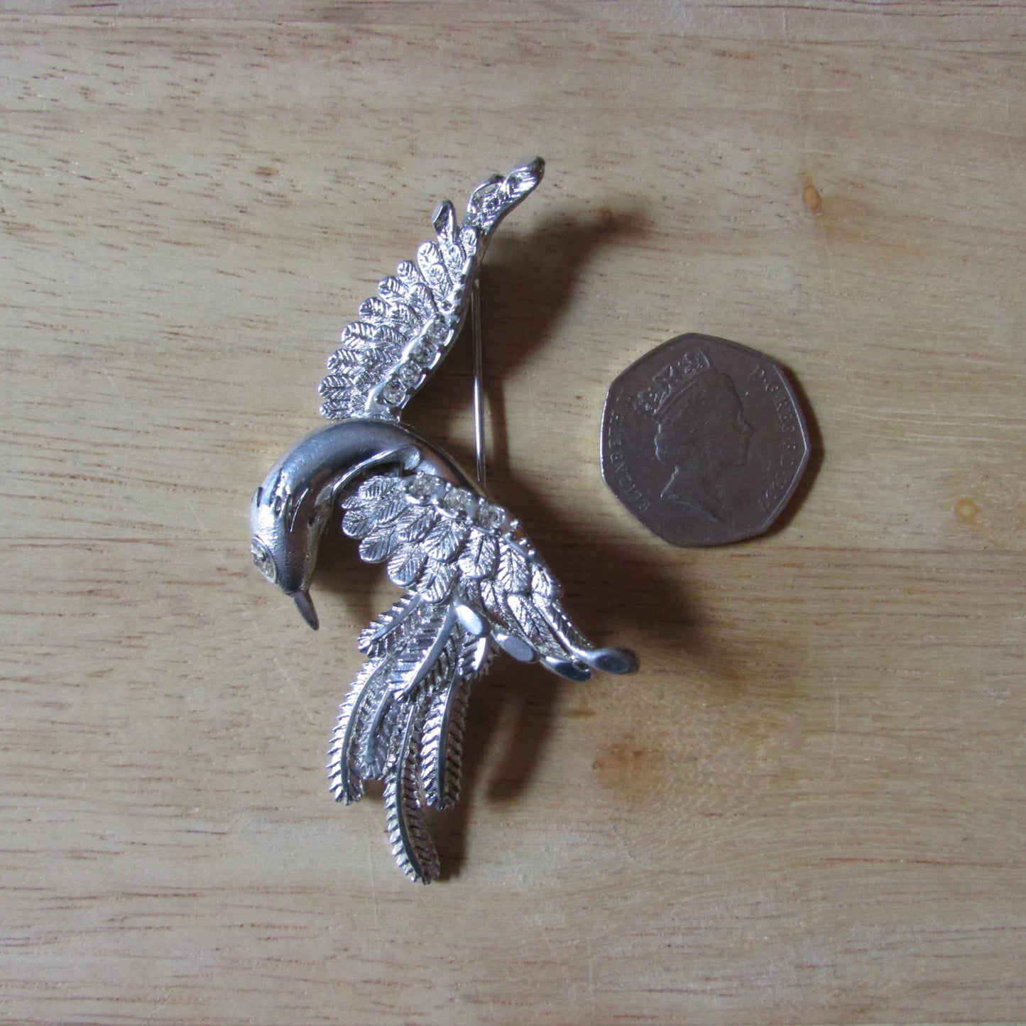 Vintage large silver-tone bird in flight brooch with textured feather detail & diamanté eye