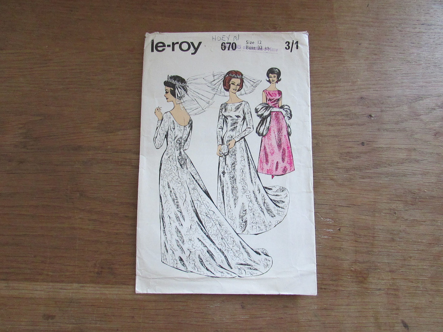 Uncut 1960s Le Roy 670 sewing pattern for misses' wedding or evening dress, size 12 (complete)