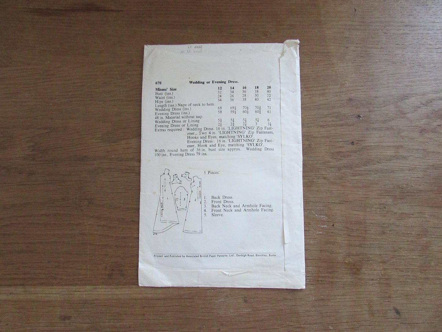 Uncut 1960s Le Roy 670 sewing pattern for misses' wedding or evening dress, size 12 (complete)