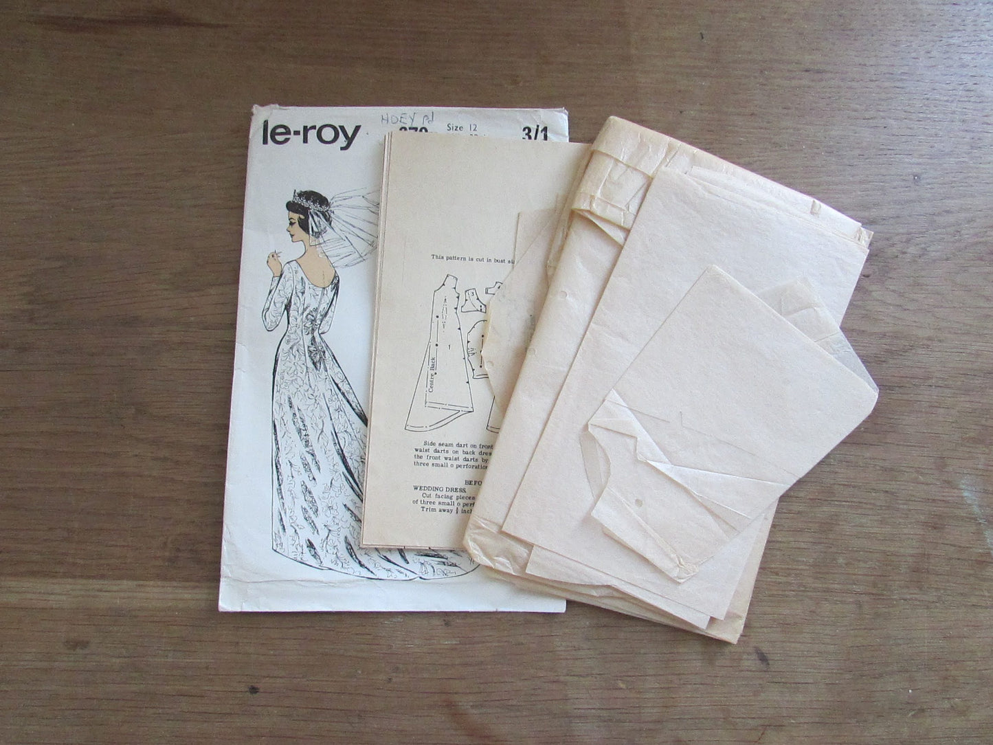 Uncut 1960s Le Roy 670 sewing pattern for misses' wedding or evening dress, size 12 (complete)