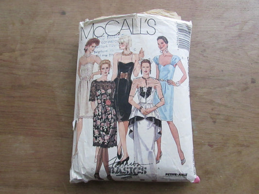 Used 1988 McCall's 3992 sewing pattern for gown, dresses & belt, size 12 (complete) slightly torn in places