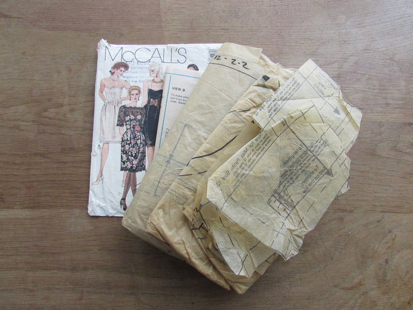 Used 1988 McCall's 3992 sewing pattern for gown, dresses & belt, size 12 (complete) slightly torn in places