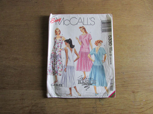 Part cut 1991 McCall's 5330 sewing pattern for misses' dress & sundress, sizes 12 to 16 (part cut to size 16, complete)