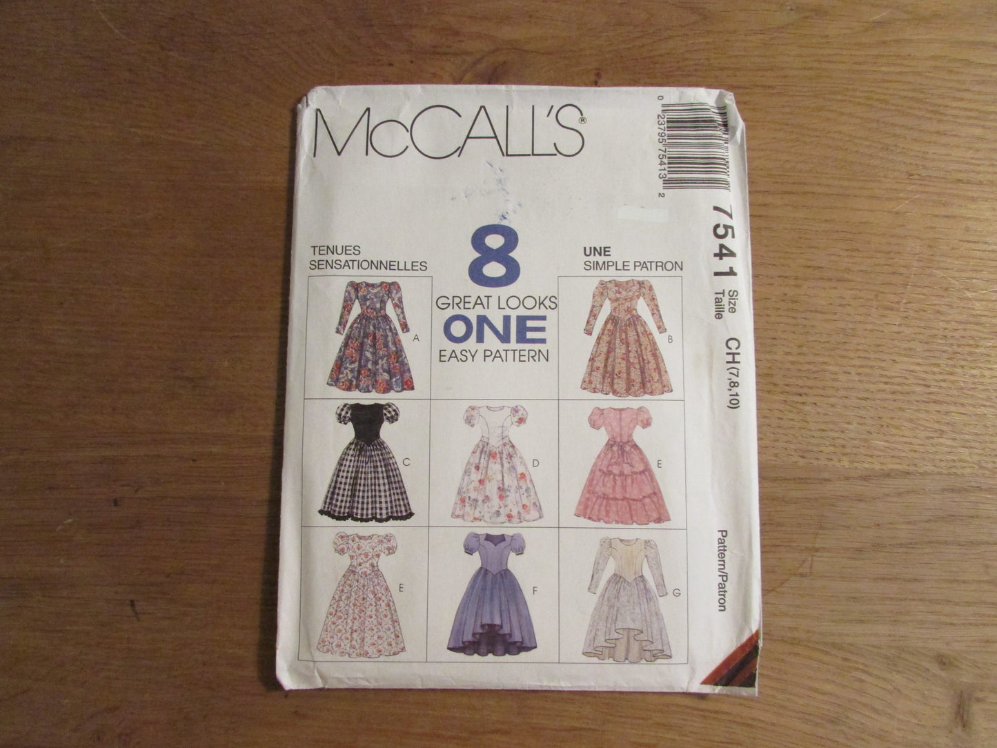 Uncut 1995 McCall's 7541 sewing pattern for children's & girls' dresses, sizes 7-8-10 (complete)