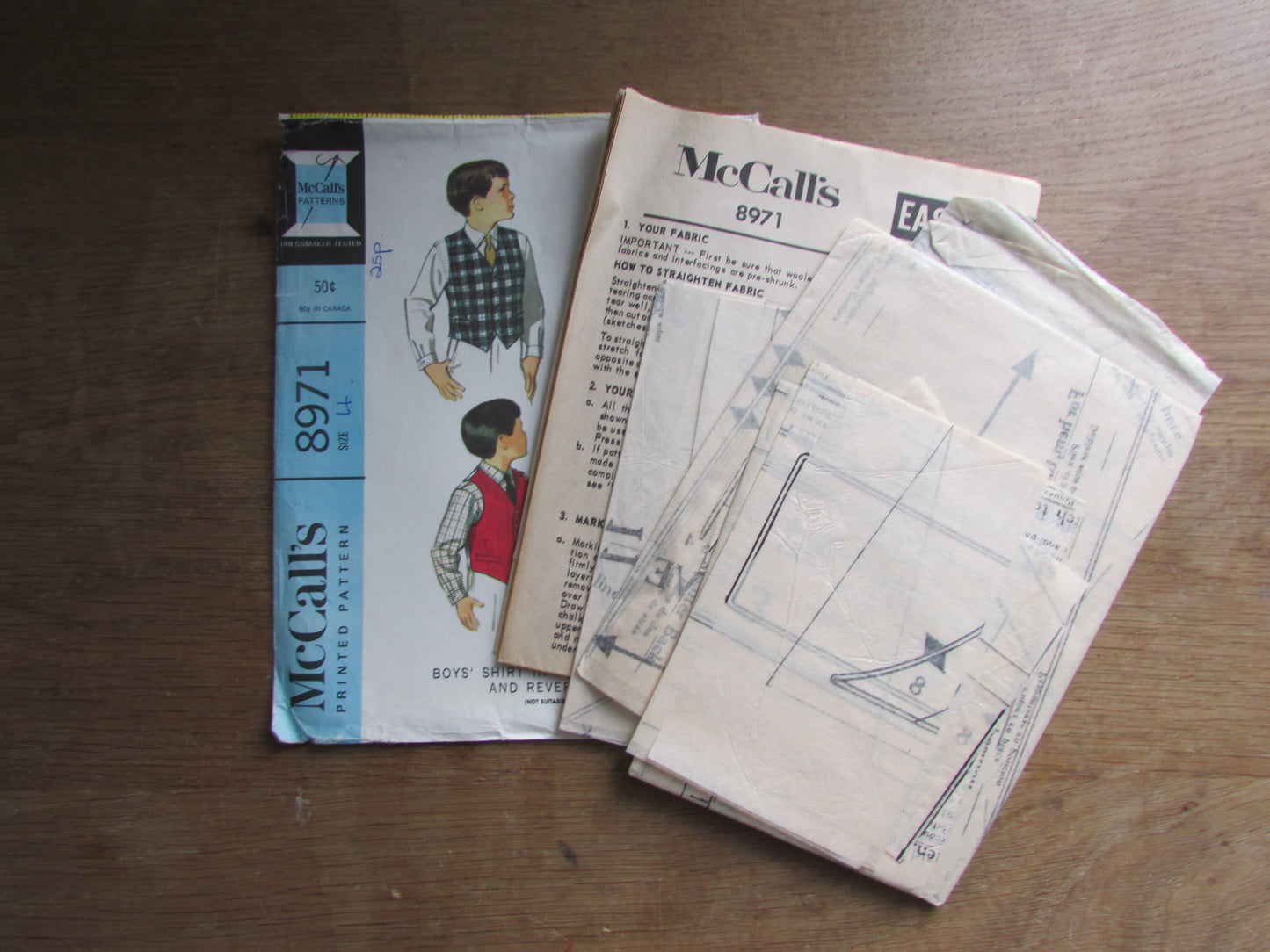 Part cut 1960s McCall's 8971 sewing pattern for boy's shirt in two versions, vest & reversible  vest, size 4 (complete)
