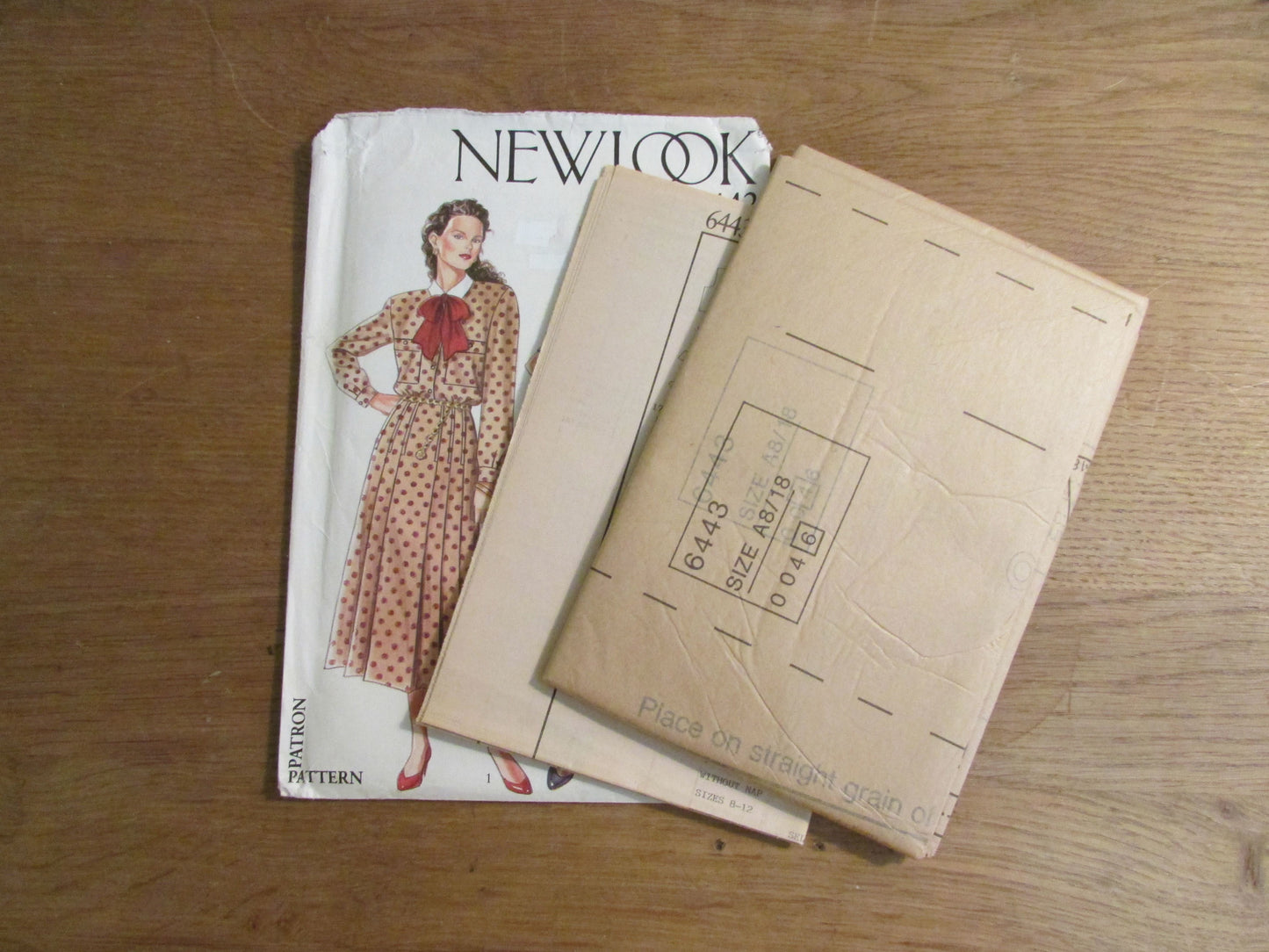 Uncut 1980s New Look 6443 sewing pattern for dress with bow, sizes 8-18 (complete)