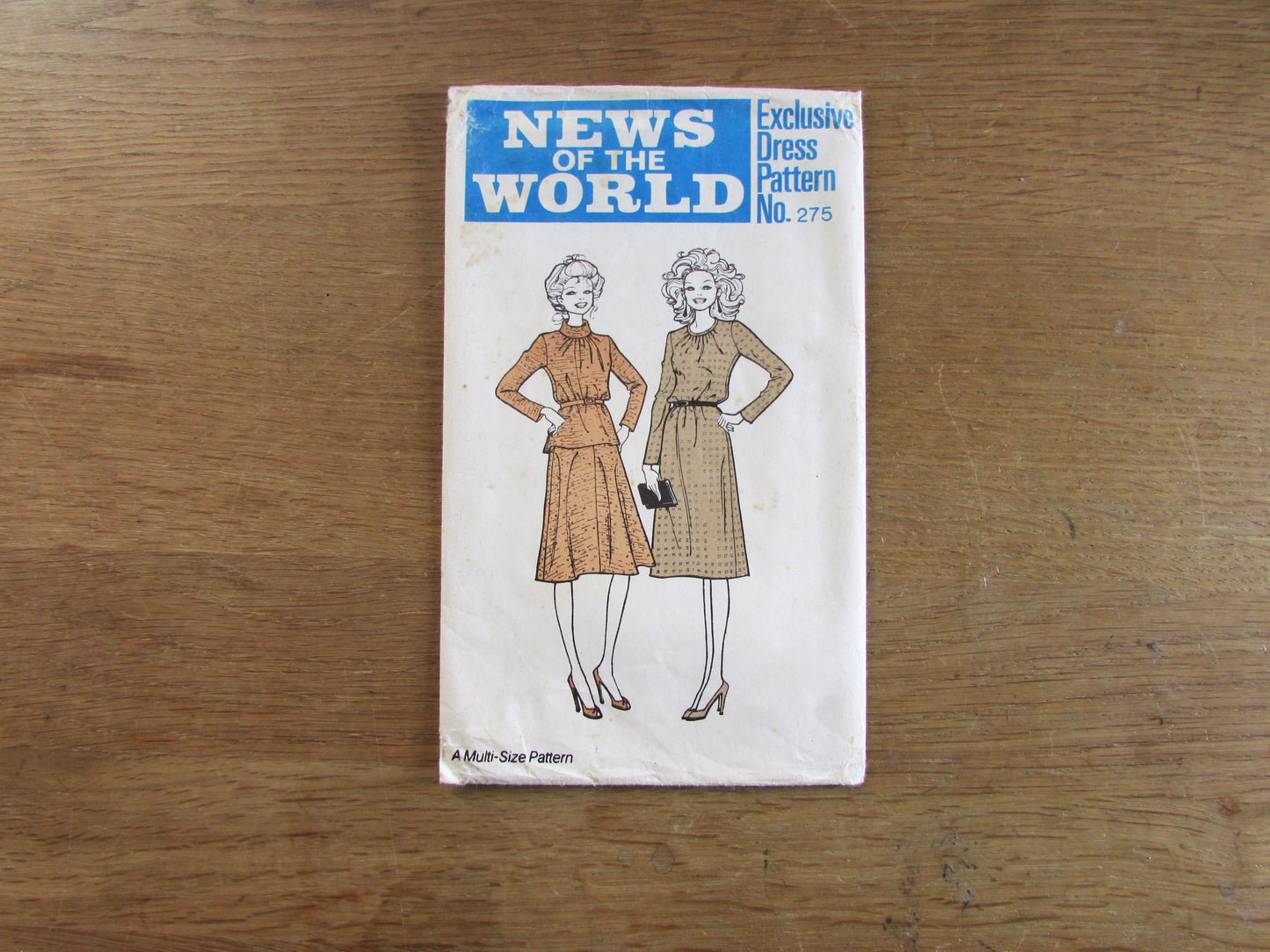 Uncut 1970s News of The World 275 sewing pattern for four-sizes-in-one dress, sizes 10-12-14-16 (complete)