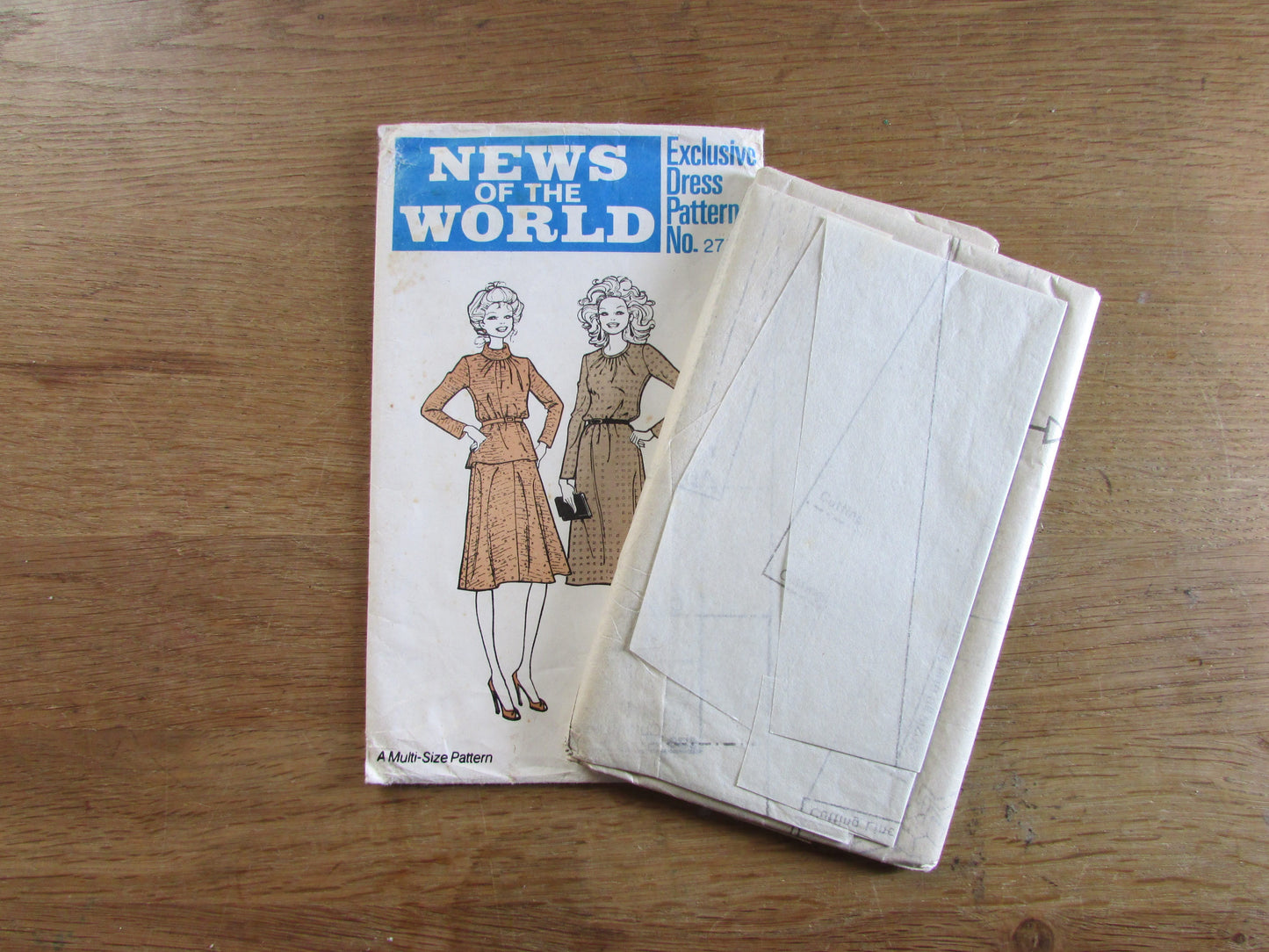 Uncut 1970s News of The World 275 sewing pattern for four-sizes-in-one dress, sizes 10-12-14-16 (complete)