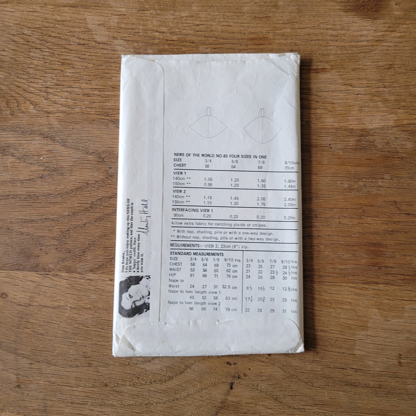 Uncut 1970s News of The World No.83 sewing pattern for hooded poncho, sizes 3/4 years to 9/10 years (complete)