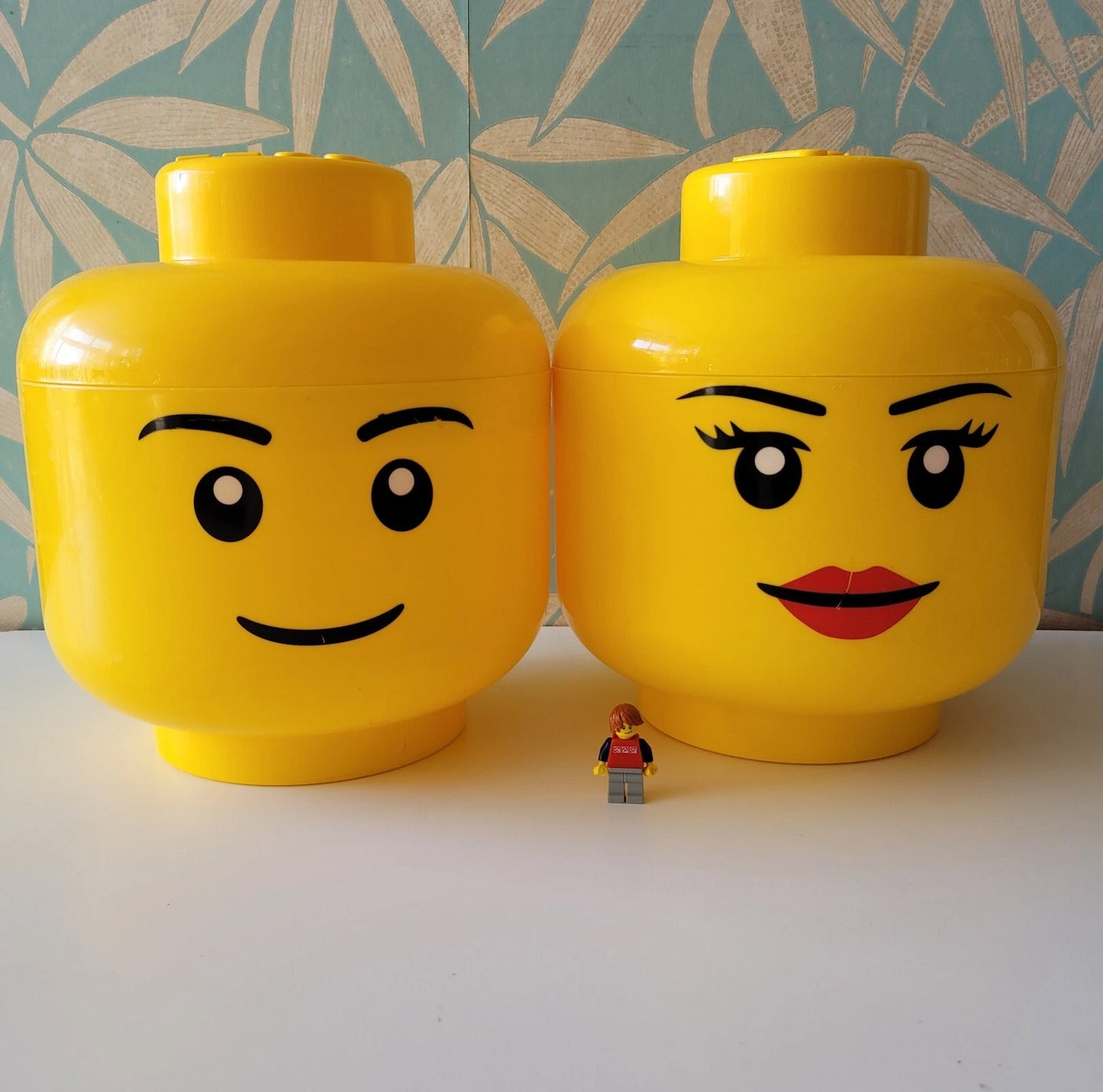 Pair of large 2012 LEGO male & female head plastic storage containers