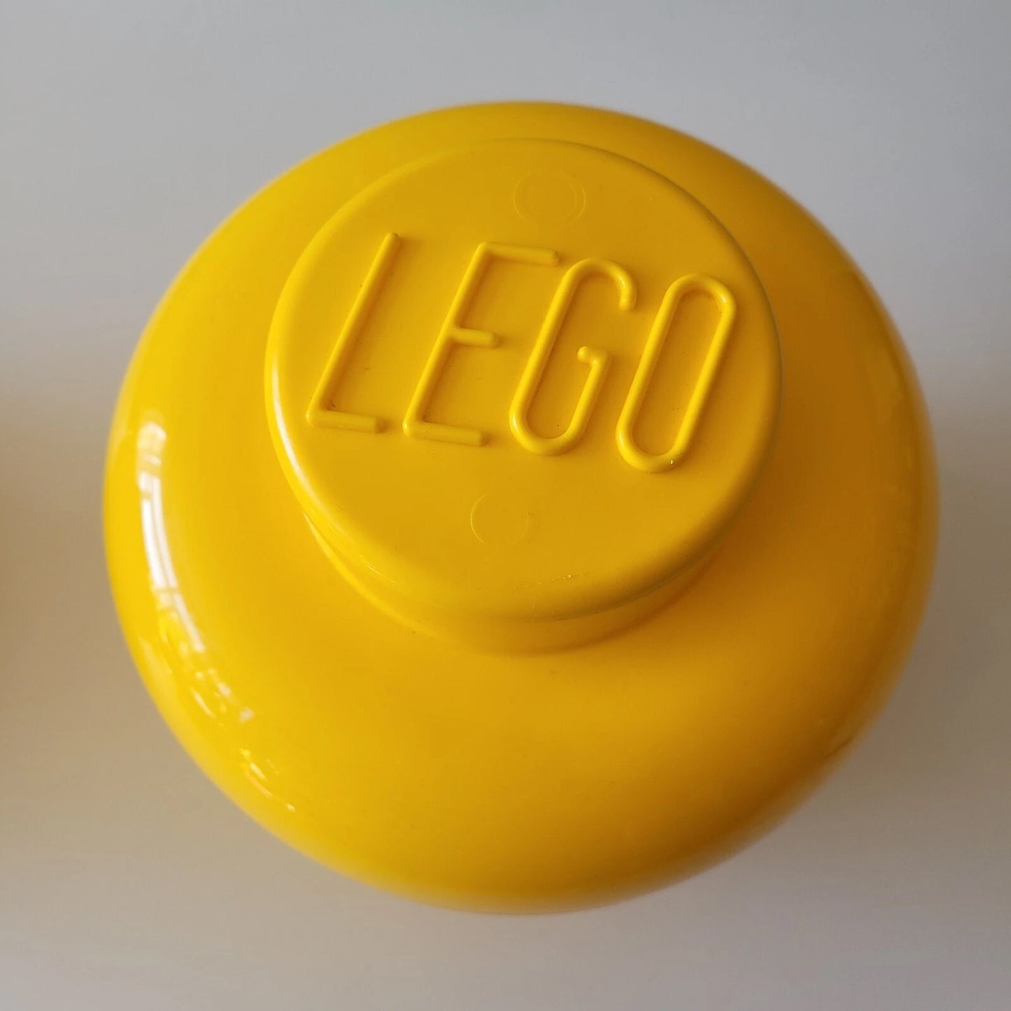 Pair of large 2012 LEGO male & female head plastic storage containers