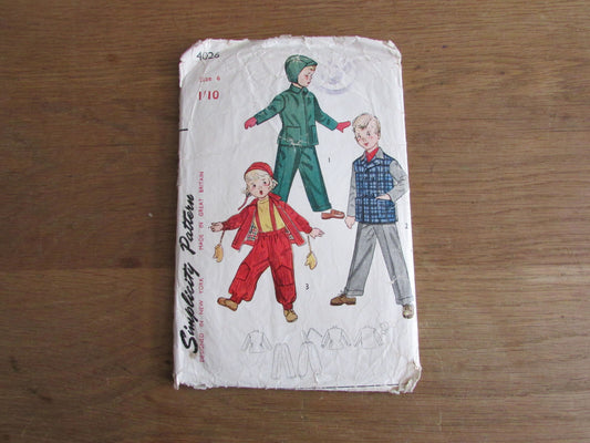 Part cut 1950s Simplicity 4026 sewing pattern for child's snowsuit, jacket, slacks & helmet, size 6 (see description below)