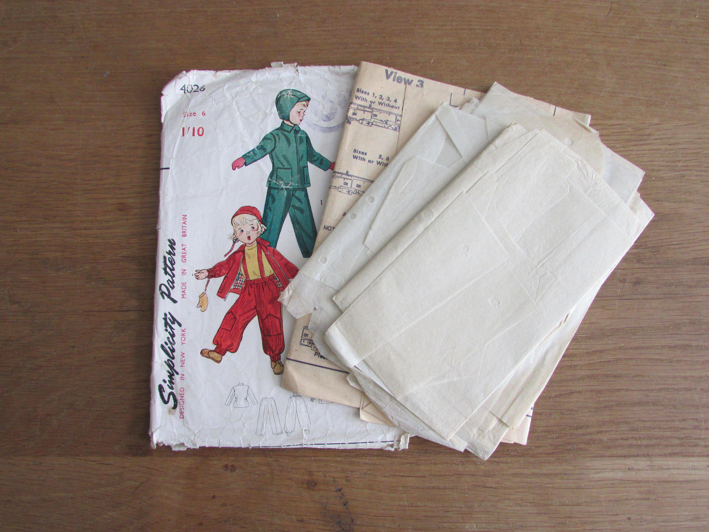 Part cut 1950s Simplicity 4026 sewing pattern for child's snowsuit, jacket, slacks & helmet, size 6 (see description below)
