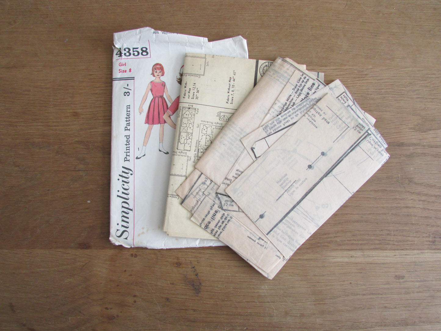 Part cut 1950s/60s Simplicity 4358 sewing pattern for girls' one-piece dress, skirt, jacket & scarf, girl size 8 (complete)