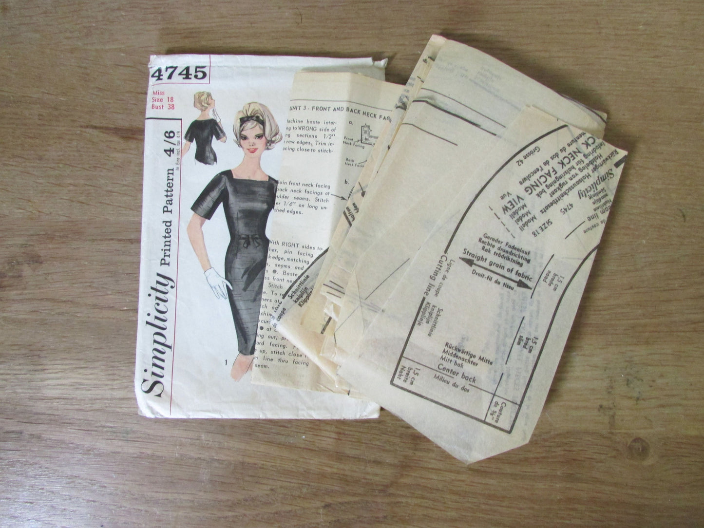 Part cut 1963 Simplicity 4745 sewing pattern for misses' one-piece dress with two backs, size 18 (complete)