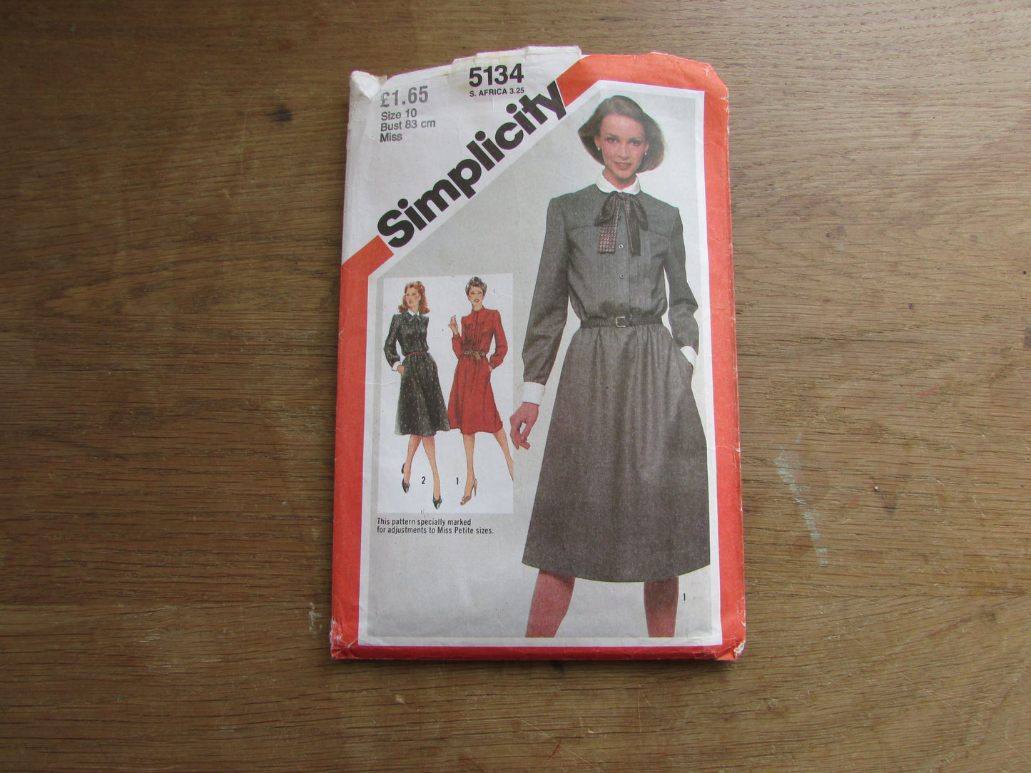 Part cut 1981 Simplicity 5134 sewing pattern for misses' pullover dress with detachable collars & cuffs and bow tie, size 10 (complete)