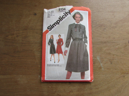 Part cut 1981 Simplicity 5134 sewing pattern for misses' pullover dress with detachable collars & cuffs and bow tie, size 10 (complete)