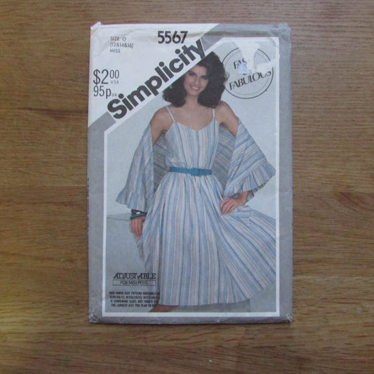 Part cut 1982 Simplicity 5567 sewing pattern for misses' pullover dress and shawl, sizes 12-14-16 (complete, see description below)