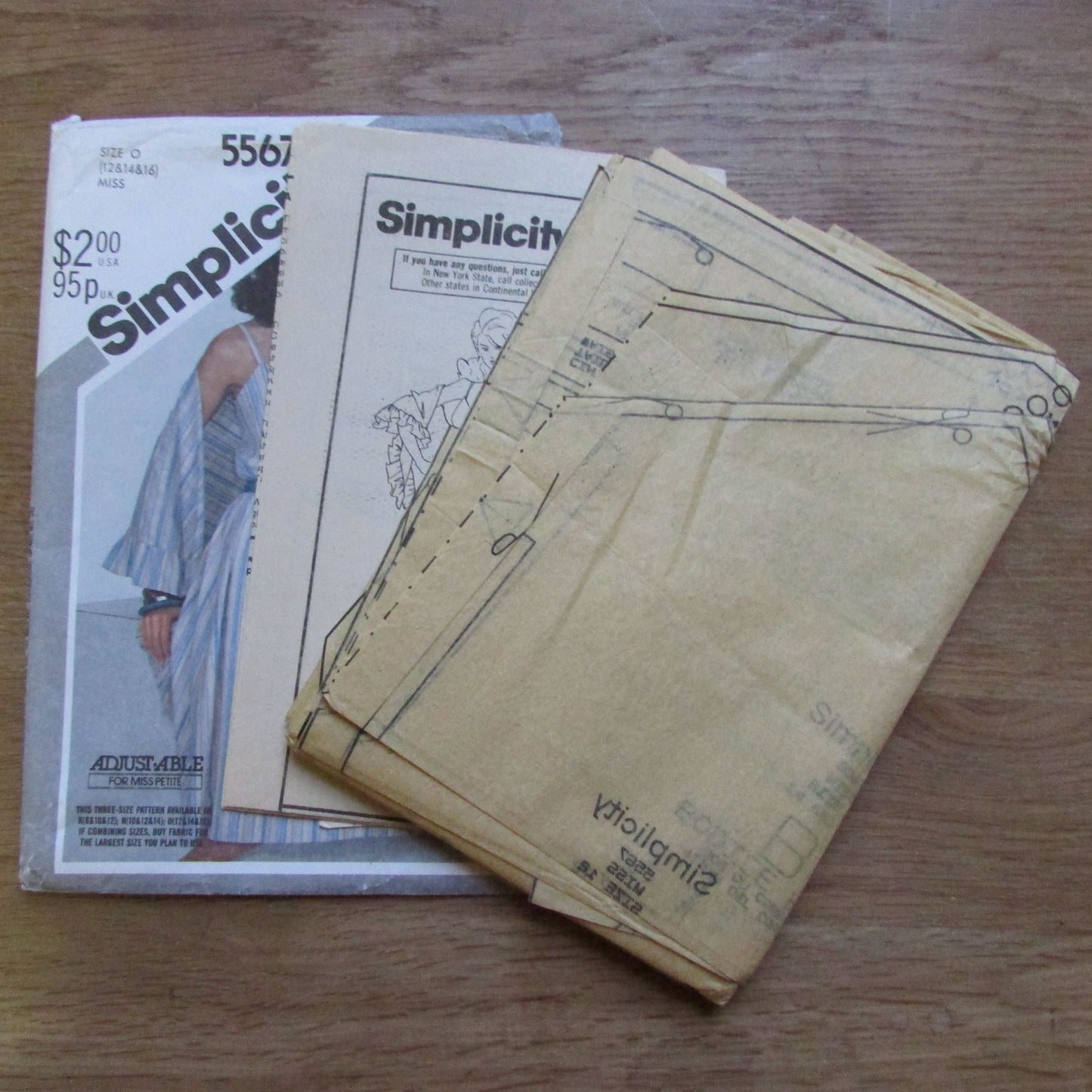 Part cut 1982 Simplicity 5567 sewing pattern for misses' pullover dress and shawl, sizes 12-14-16 (complete, see description below)