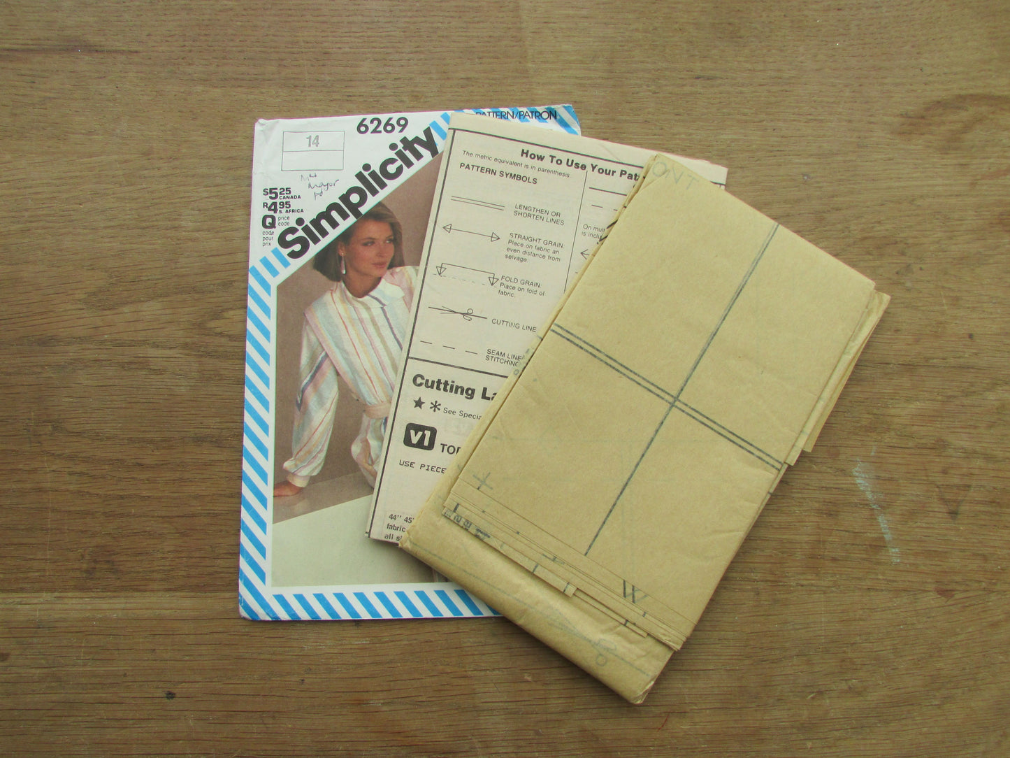 Uncut 1983 Simplicity 6269 sewing pattern by Henry Grethel for misses' two-piece dress with sleeve variations, size 14 (complete)