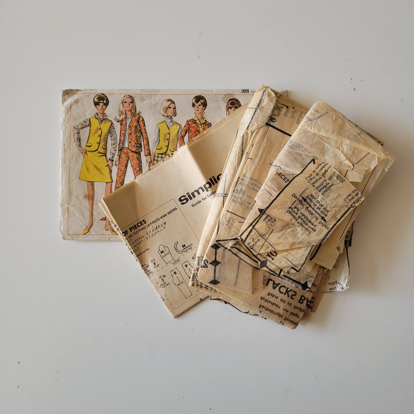 Part cut 1967 Simplicity 7089 sewing pattern for misses' jacket or sleeveless jacket, skirt & slacks, size 12 (see description below)