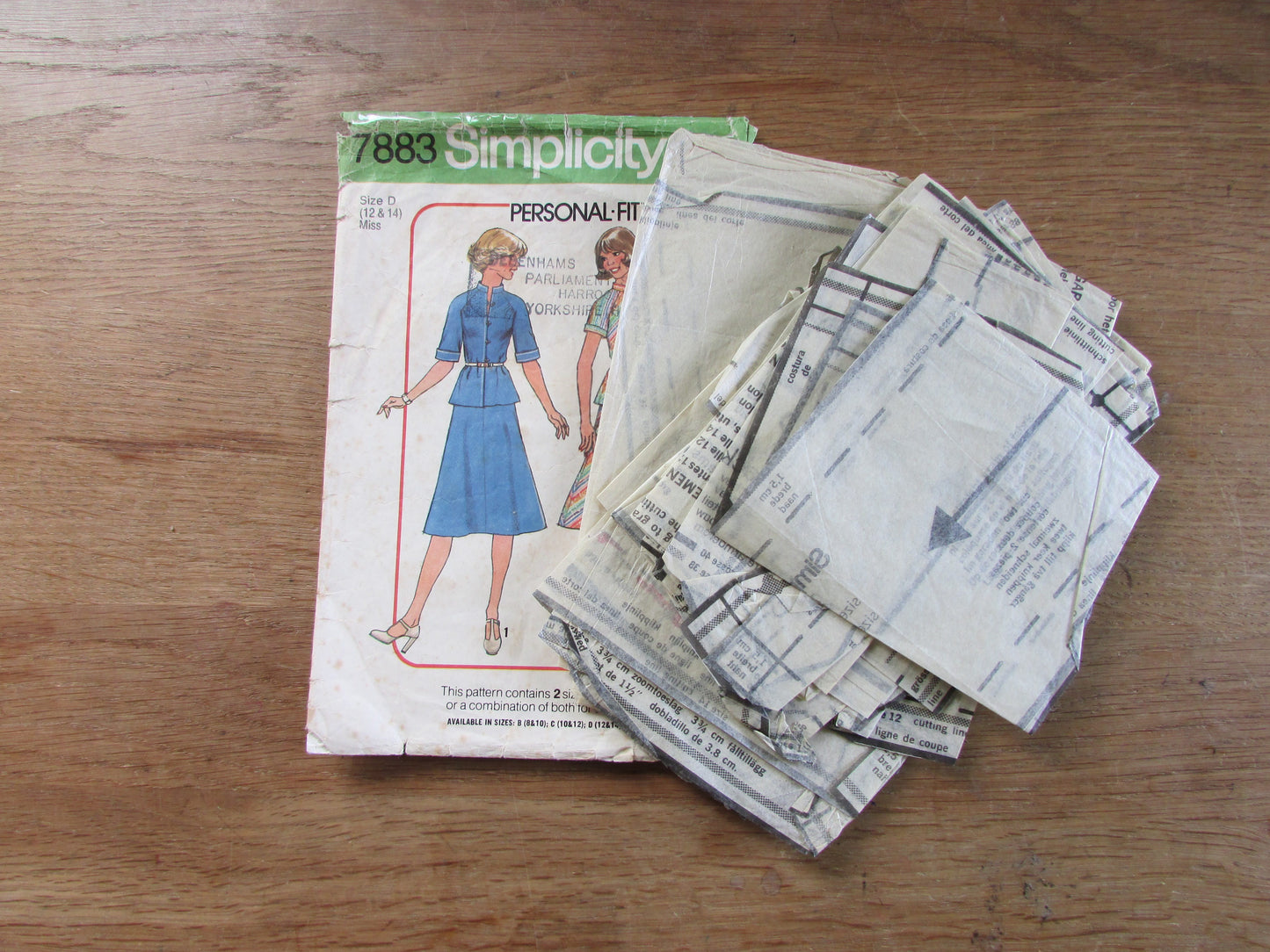 Part cut 1977 Simplicity 7883 sewing pattern for misses' bias two-piece dress (part cut to size 14, complete but missing instructions)