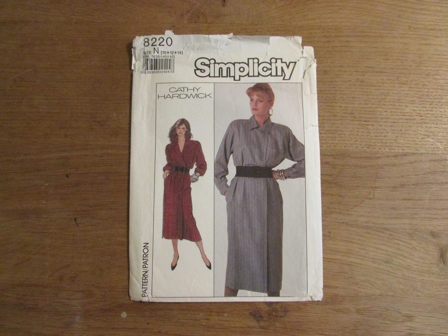 Part cut 1987 Simplicity 8220 Cathy Hardwick sewing pattern for misses' easy-to-sew mock-wrap dress, size 14 (complete)