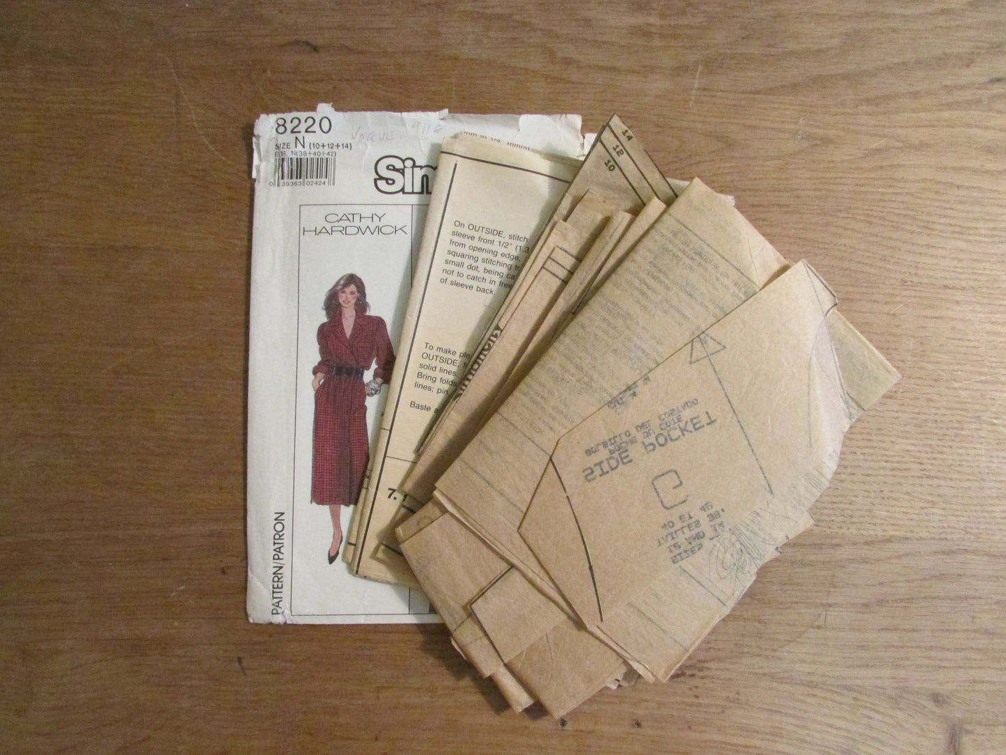 Part cut 1987 Simplicity 8220 Cathy Hardwick sewing pattern for misses' easy-to-sew mock-wrap dress, size 14 (complete)