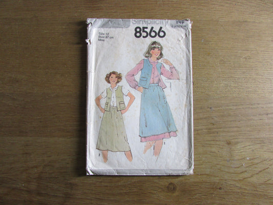 Part cut 1978 Simplicity 8566 sewing pattern for misses' blouse, skirt or layered skirt & reversible vest, size 12 (complete)
