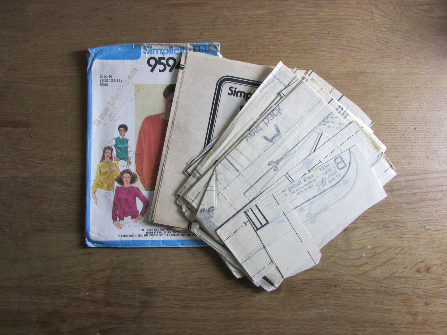 Part cut 1980 Simplicity 9594 sewing pattern for twin sweater set or cardigan & pullover, sizes 10 to 14 (part cut to size 14, complete)